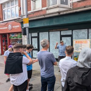 Marten Holmes preaching to a crowd